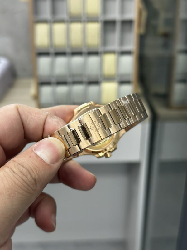 Replica Patek Philippe Ladies Nautilus Golden Dial Rose Gold 7118 1200R 010 36 Replica Patek Philippe Ladies Nautilus Golden Dial Rose Gold 7118 1200R 010