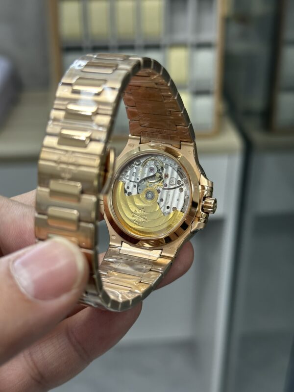 Replica Patek Philippe Ladies Nautilus Golden Dial Rose Gold 7118 1200R 010 35 Replica Patek Philippe Ladies Nautilus Golden Dial Rose Gold 7118 1200R 010