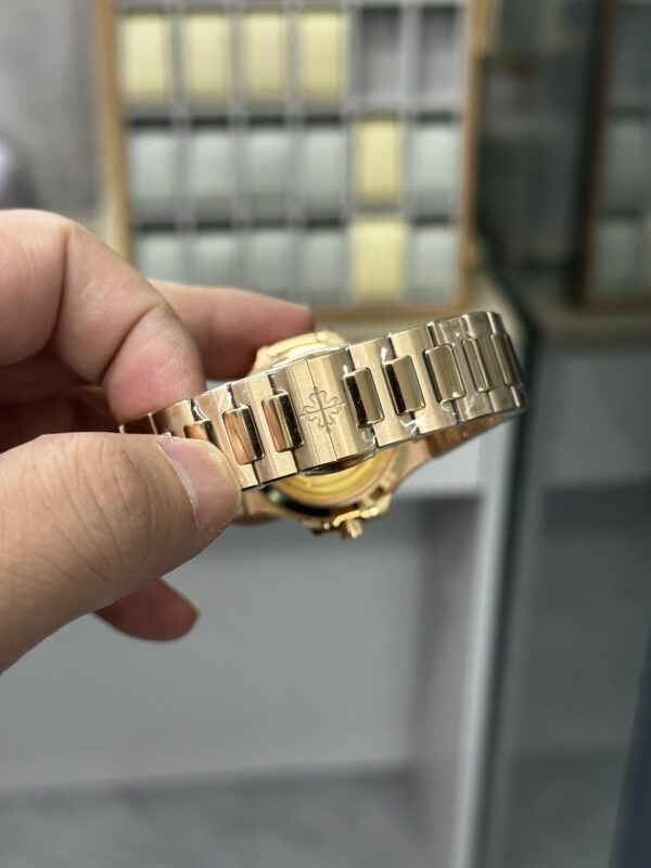 Replica Patek Philippe Ladies Nautilus Golden Dial Rose Gold 7118 1200R 010 42 Replica Patek Philippe Ladies Nautilus Golden Dial Rose Gold 7118 1200R 010