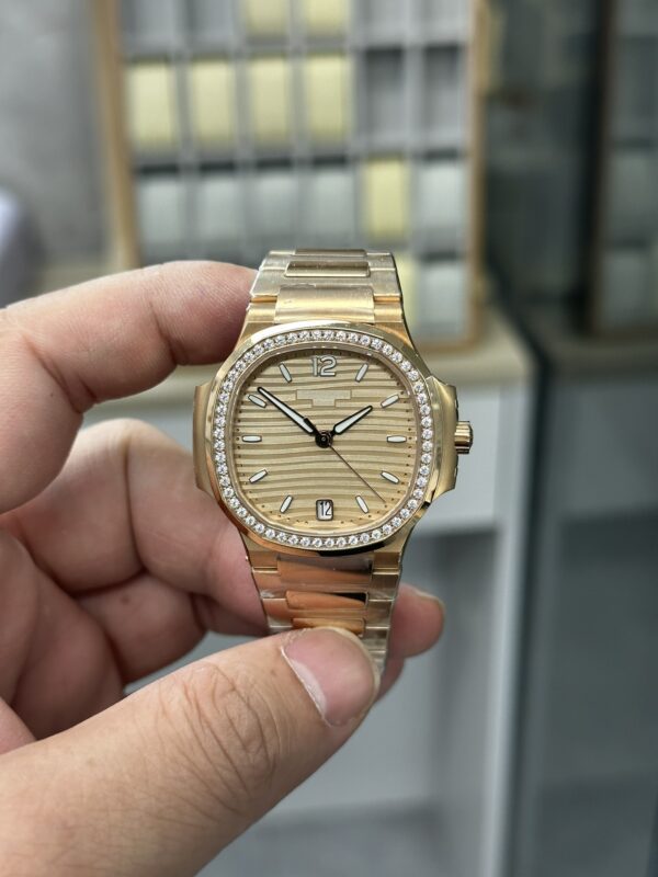 Replica Patek Philippe Ladies Nautilus Golden Dial Rose Gold 7118 1200R 010 30 Replica Patek Philippe Ladies Nautilus Golden Dial Rose Gold 7118 1200R 010