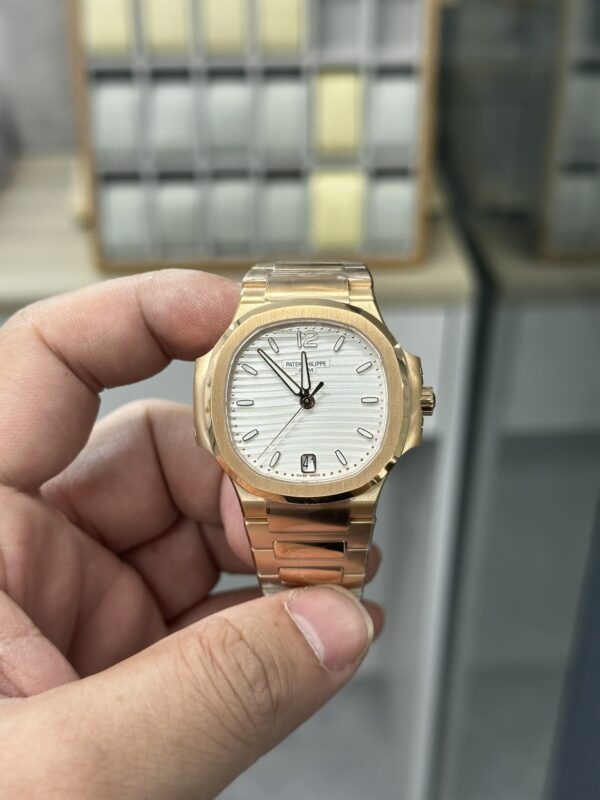 Replica Patek Philippe Ladies Nautilus Golden Dial Rose Gold 7118 1200R 010 37 Replica Patek Philippe Ladies Nautilus Golden Dial Rose Gold 7118 1200R 010