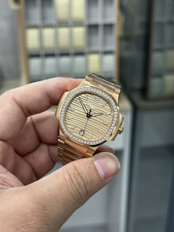 Replica Patek Philippe Ladies Nautilus Golden Dial Rose Gold 7118 1200R 010 31 Replica Patek Philippe Ladies Nautilus Golden Dial Rose Gold 7118 1200R 010