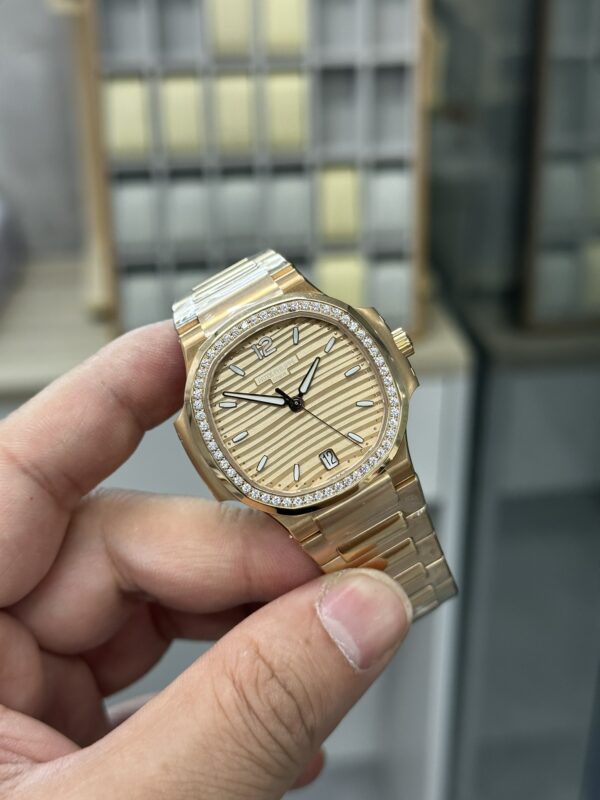 Replica Patek Philippe Ladies Nautilus Golden Dial Rose Gold 7118 1200R 010 33 Replica Patek Philippe Ladies Nautilus Golden Dial Rose Gold 7118 1200R 010